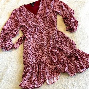 Forever 21 Burgundy w/white floral, long sleeve mini wrap dress.